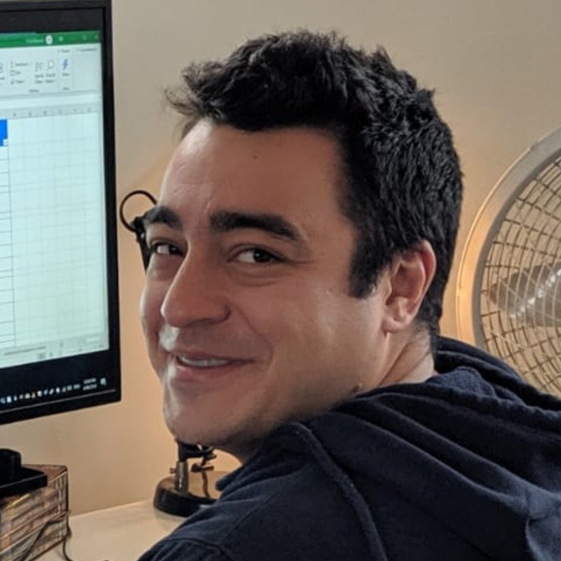 Selfie of Paul with his two doggos in the car